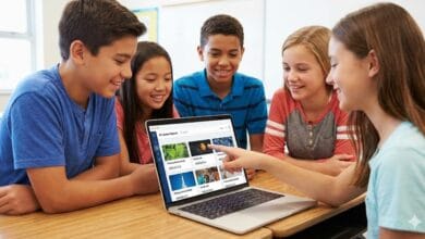 Students using AI-powered educational search tool in collaborative classroom setting.