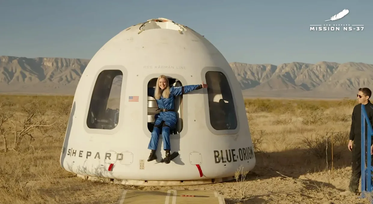 Michaela Benthaus celebrates after becoming the first wheelchair user to fly to space with Blue Origin.